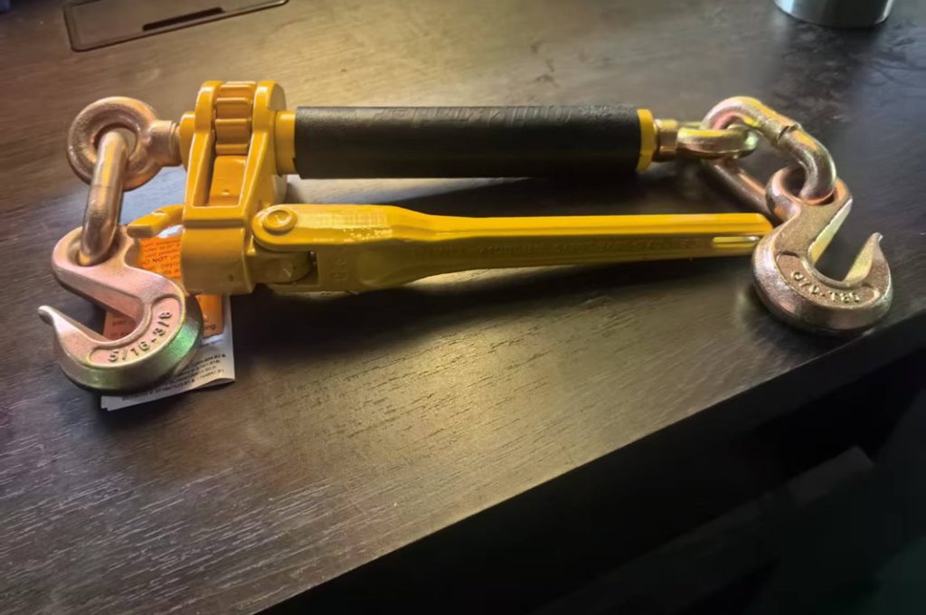 Folding load binder